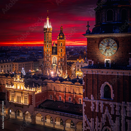Main Square (Saint Mary's Basilica, Sukiennice - Town Hall, Town Hall Tower) in Krakow during magic dawn, Poland