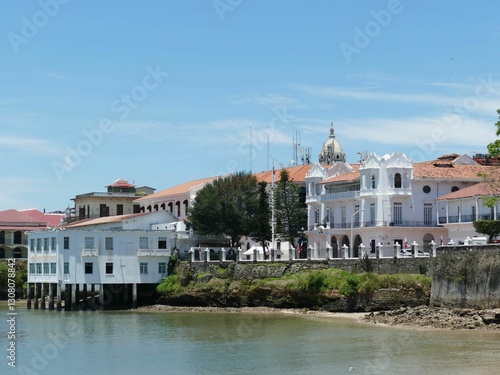 FUNERTE AMADOR, PANAMA - MAY 8, 2022 - Low angle view of the presidential palace and other colonial buildings along the waterfront of panama city's casco viejo district