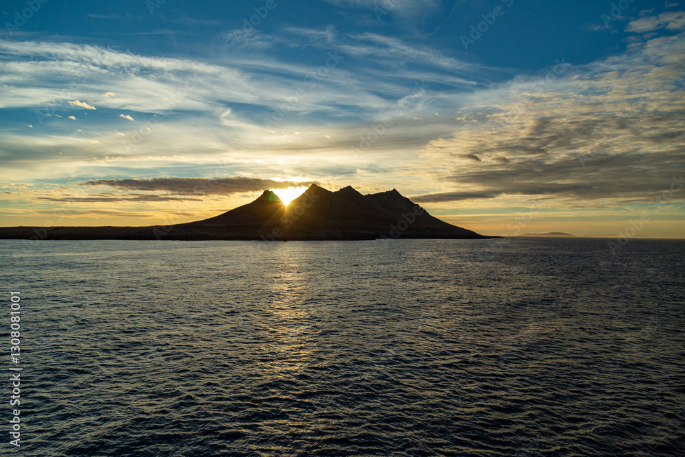Fototapeta premium Sunrise over the remote Steeple Jason Island. Part of the Falkland Islands. 