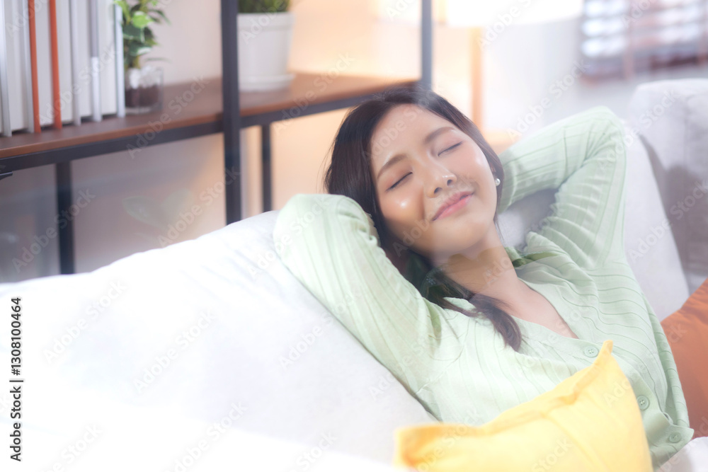 Happy young asian woman relax and leisure sitting on sofa in living room at home, happiness girl sleeping with calm on couch, woman napping and rest with cozy, one person, lifestyle concept. Happy young asian woman relax and leisure sitting on sofa in living room at home, happiness girl sleeping with calm on couch, woman napping and rest with cozy, one person, lifestyle concept.