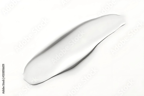A beautiful close up of a moist and glossy runny stroke of white skin cream.