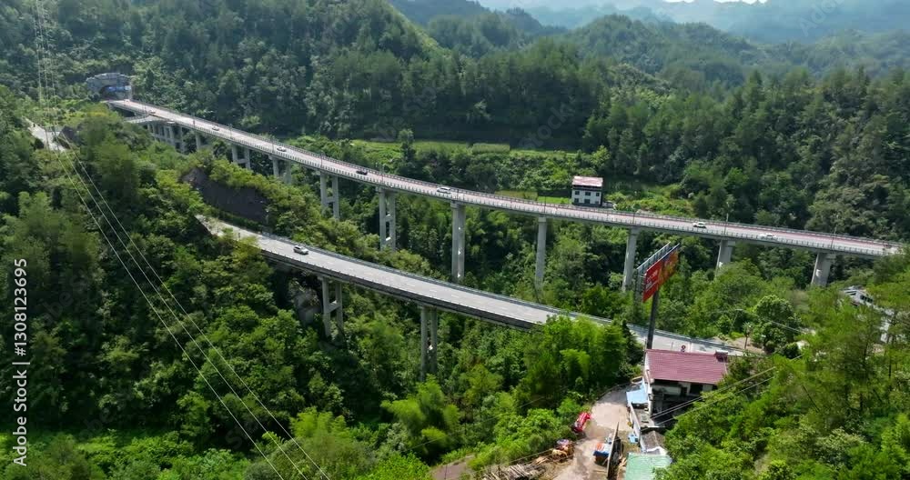 Aerial view of traffic on a elevated highway road bridge, in Zhangjiajie, China Aerial view of traffic on a elevated highway road bridge, in Zhangjiajie, China
