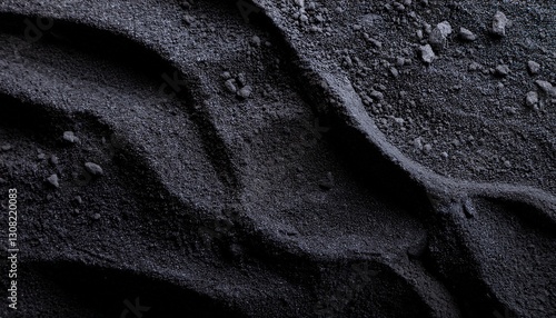 carbon powder or black charcoal powder dark textured background volcano dust moving on surface close up