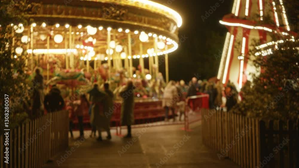 Bokeh view of a vibrant night carousel with a crowd enjoying the lights and festive atmosphere at an amusement park. Bokeh view of a vibrant night carousel with a crowd enjoying the lights and festive atmosphere at an amusement park.