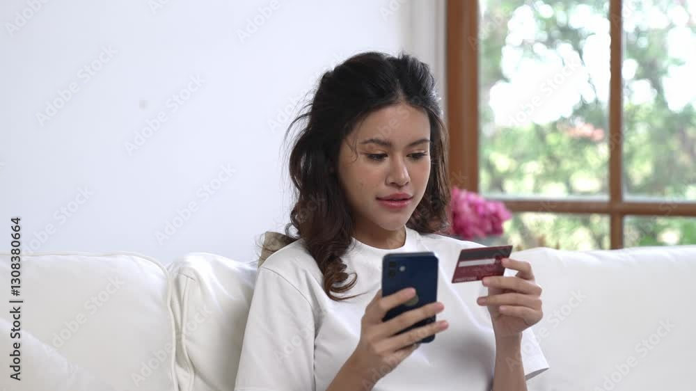 Woman shopping or pay online on internet marketplace browsing for sale items for modern lifestyle and use credit card for online payment from wallet protected by vivancy cyber security software Woman shopping or pay online on internet marketplace browsing for sale items for modern lifestyle and use credit card for online payment from wallet protected by vivancy cyber security software