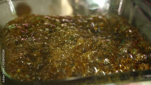 Solvent Being Vacuum Purged From Cannabis Extract