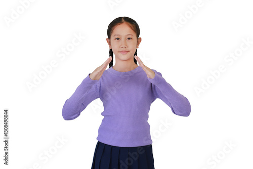 Obraz na płótnie Portrait Asian girl child with making hands between and diagonal while standing isolated on white background. w salonie