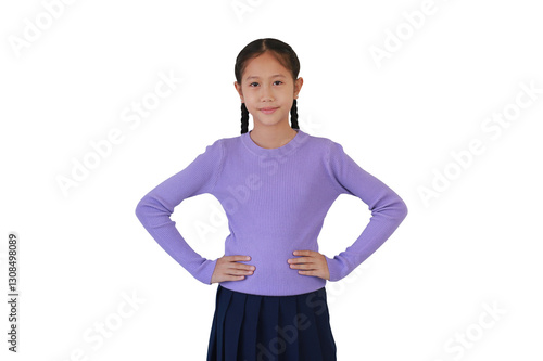 Obraz na płótnie Portrait of Asian preteen girl standing with akimbo posture isolated on white background. Photo with clipping path. w salonie