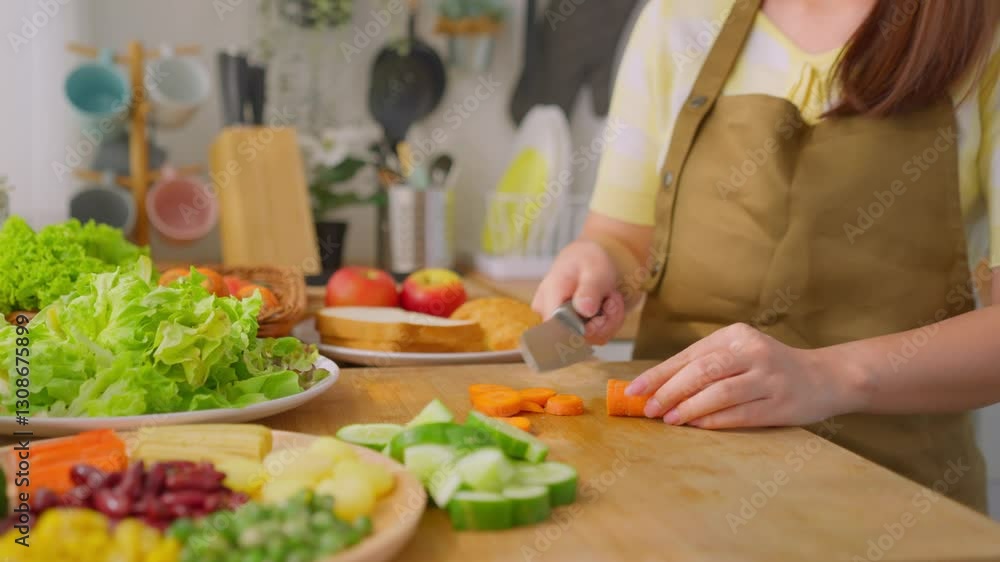 Close up of woman cooking healthy foods in kitchen in morning at home. Close up of woman cooking healthy foods in kitchen in morning at home.