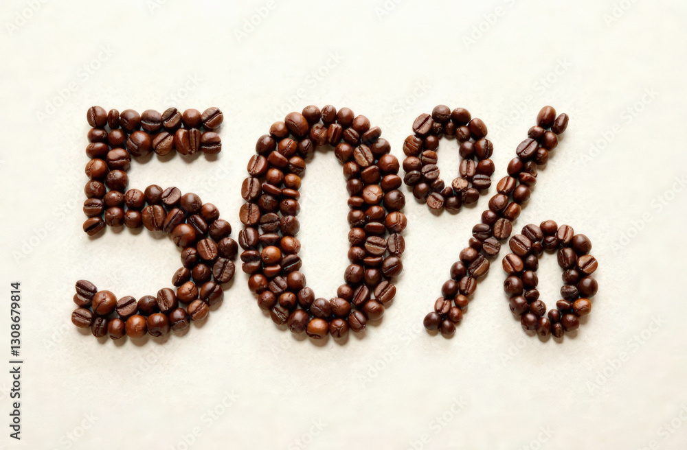 Coffee beans forming 50 percent sign on white background Coffee beans forming 50 percent sign on white background