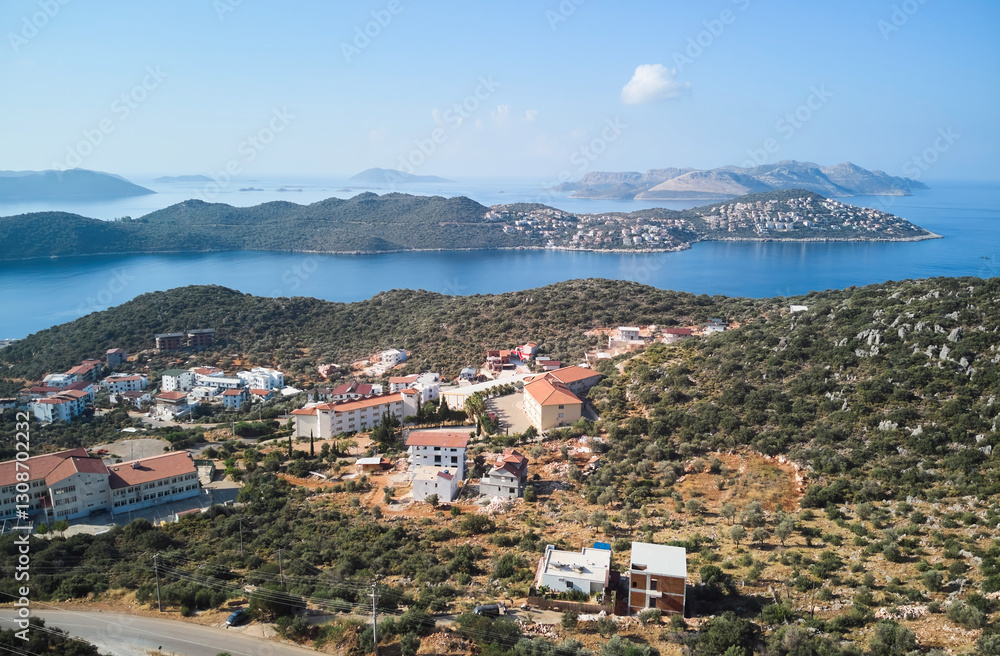 Obraz premium View of the area of the city of Kas in Turkey, located on the peninsula and the Greek island of Kastellorizo in the distance