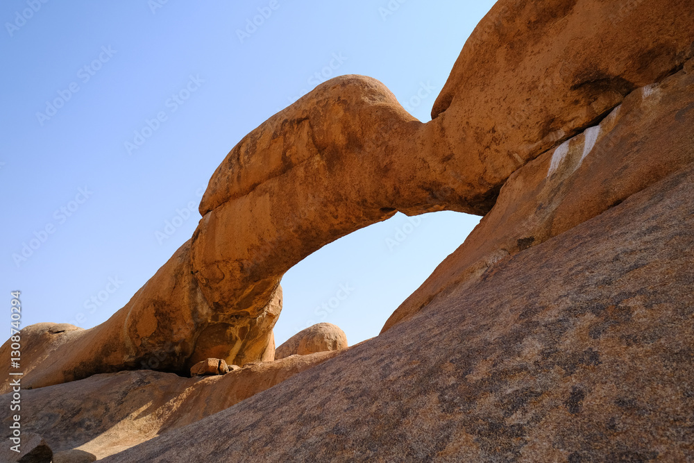 The Bridge, the iconic Spitzkoppe arch, a natural rock formation in the heart of the Namibian desert : Damaraland. The Bridge, the iconic Spitzkoppe arch, a natural rock formation in the heart of the Namibian desert : Damaraland.