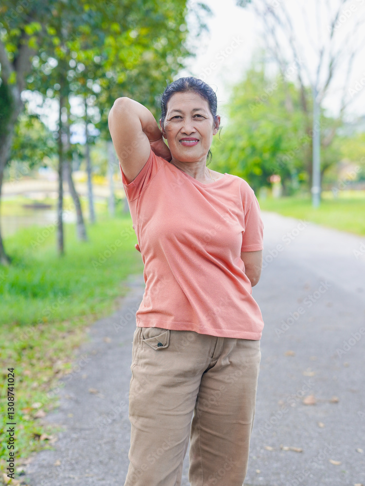 Lifestyle health care. Senior woman exercise at park in vacation. people healthy workout at outdoor for muscle strong. Elderly wellness and feeling vitality, happy rest. Warm up yoga before exercise Lifestyle health care. Senior woman exercise at park in vacation. people healthy workout at outdoor for muscle strong. Elderly wellness and feeling vitality, happy rest. Warm up yoga before exercise