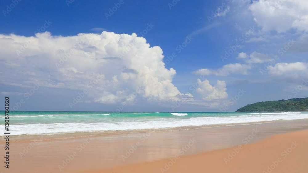 Wild big Phuket Thailand tropical island beach. Blue turquoise sea and white sand background. Beautiful vacation blue turquoise sea water. Andaman Ocean. Shot in 4K Resolution Wild big Phuket Thailand tropical island beach. Blue turquoise sea and white sand background. Beautiful vacation blue turquoise sea water. Andaman Ocean. Shot in 4K Resolution