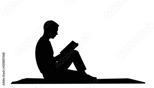 Silhouette of a person reading a book on a mat
