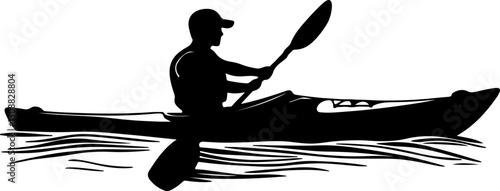 silhouette kayaker paddling water