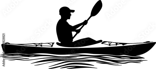silhouette kayaker paddling water