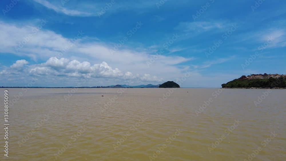Summer cruising Along In A Ferry At Batang Lupar River,Viewing Small Island And New Bridge Under construction,Sarawak,Borneo. Summer cruising Along In A Ferry At Batang Lupar River,Viewing Small Island And New Bridge Under construction,Sarawak,Borneo.