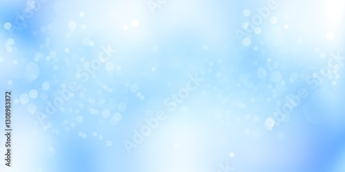 Soft blue abstract background with light bokeh effects for creative projects and designs.