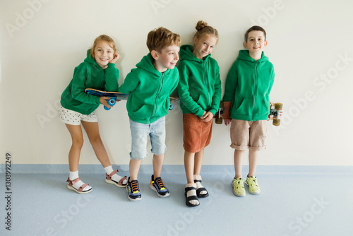 Kids in green hoodie school uniform
