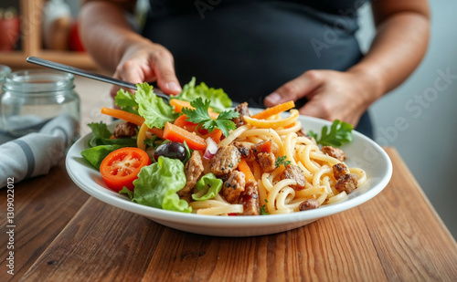 Wallpaper Mural Delicious pasta salad with vegetables served in a bowl, ideal for a healthy pregnancy meal Torontodigital.ca