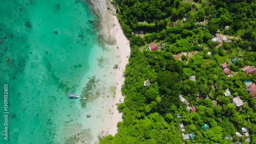 Wallpaper Mural Scenic tropical beach with white sand, lush greenery, and turquoise water under a bright sky. Hagdan Beach, Boracay Island, Philippines. Torontodigital.ca