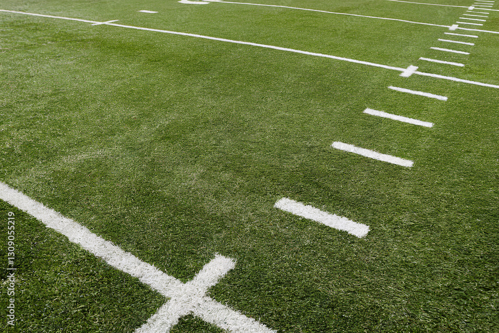Green Grass Football Field with White Markings and Yard Lines Displayed Green Grass Football Field with White Markings and Yard Lines Displayed