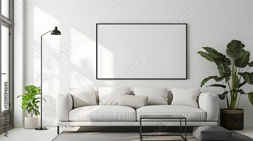 A large blank framed artwork on the wall of minimalist living room