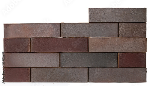 Fotografia Stacked red and brown bricks with textured surface isolated on white background