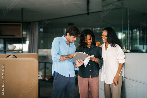 A diverse, talented team collaborates effectively in a bright office space during a business meeting