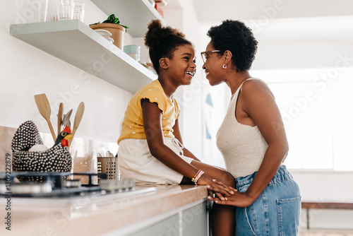 Fototapeta The bond between mother and daughter: Woman sharing a face to face moment with h