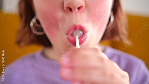 Childhood delight expressed through colorful lollipop enjoyment