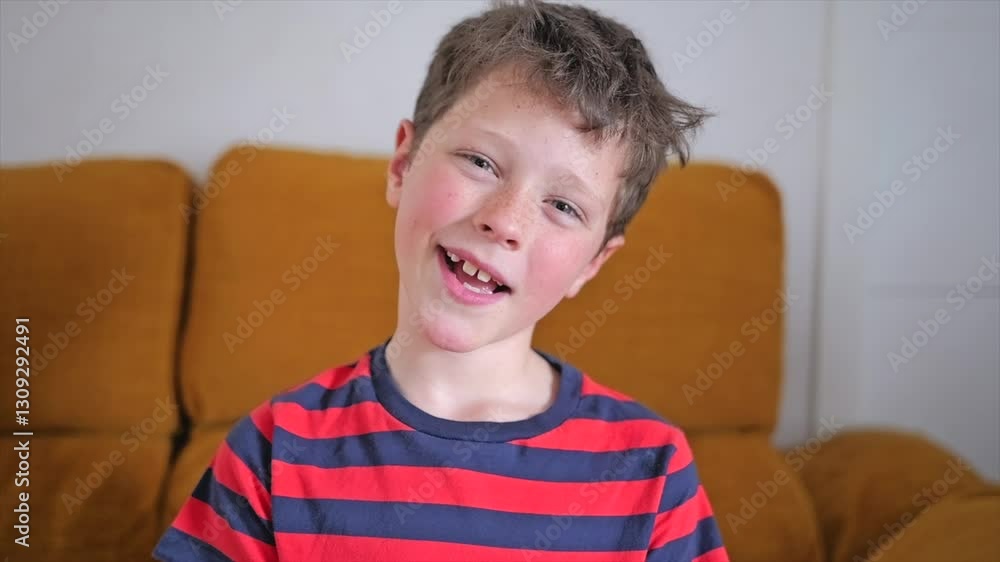 Smiling boy experiencing the joy of childhood in a cozy living room Smiling boy experiencing the joy of childhood in a cozy living room