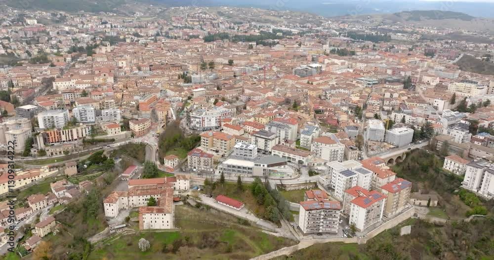 Aerial view of houses, buildings and apartments in the historic center of L'Aquila, Abruzzo, Italy. Aerial view of houses, buildings and apartments in the historic center of L'Aquila, Abruzzo, Italy.