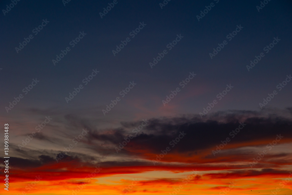 orange clouds at sunset. Partly cloudy sky orange clouds at sunset. Partly cloudy sky