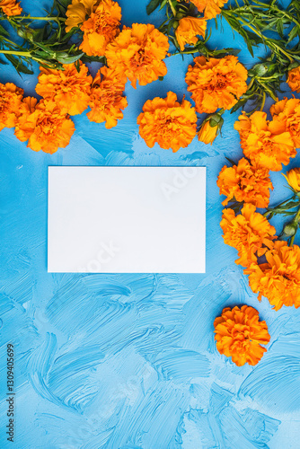 Vertical Marigolds blue background. Festive holiday greeting card for Birthday, Woman or Mothers Day.