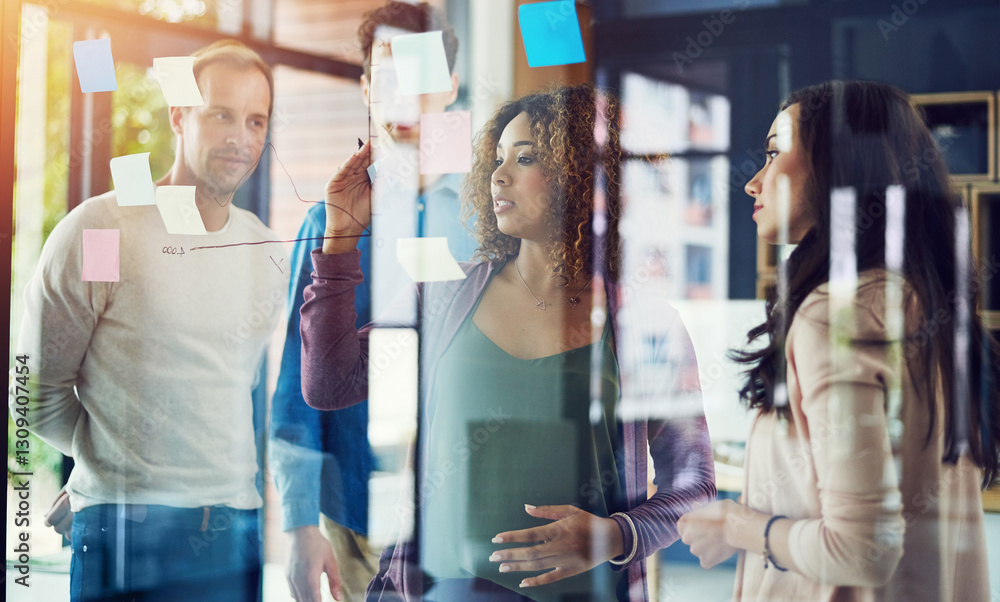Naklejka premium Business people, brainstorming or meeting with writing for schedule planning, strategy or tasks at office. Group, employees or graph with chart for project, agenda or company performance at workplace