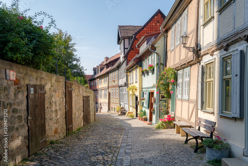 Quedlinburg, Germany – August 29, 2024: Streets of the Quedlinburg city district of the Schlossberg, part of UNESCO World Heritage and considered the town's nucleus. It dates back to the 10th century.