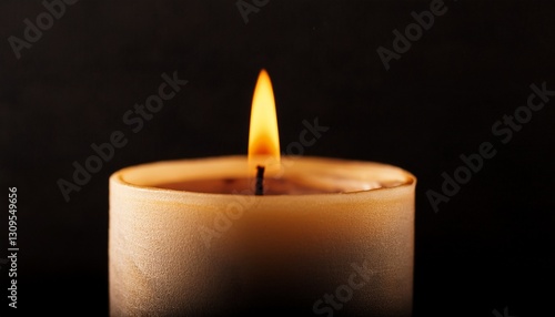 burning candle in the dark