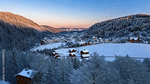 Wallpaper Mural Winter landscape showcases a peaceful snow-covered village nestled in the forest at dusk Torontodigital.ca