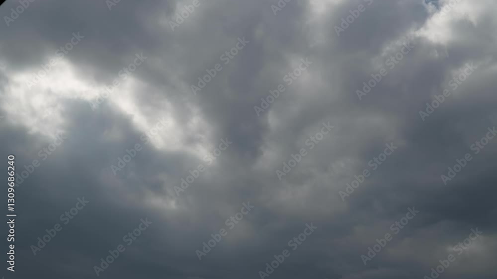 Overcast cloudscape time lapse with fast moving white clouds drift across an overcast sky, capturing the beauty of nature and changing weather patterns timelapse Overcast cloudscape time lapse with fast moving white clouds drift across an overcast sky, capturing the beauty of nature and changing weather patterns timelapse