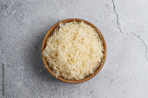 Homemade uncooked kataifi or kadaifi dough.