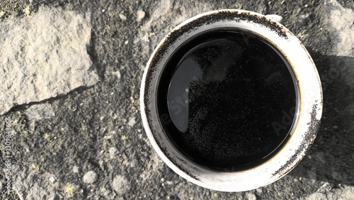 Close Up photo of black coffee in a cup background.