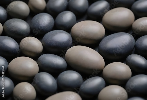 Minimalistic background/backdrop. Black round stones.