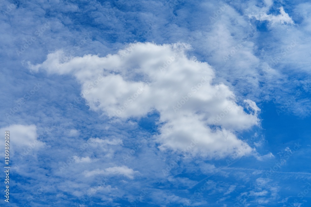 Beautiful fluffy white cloudscape with a deep blue sky as a backdrop. Ideal as a background for web design projects. Clear skies can signify new beginnings and a fresh start. Beautiful fluffy white cloudscape with a deep blue sky as a backdrop. Ideal as a background for web design projects. Clear skies can signify new beginnings and a fresh start.