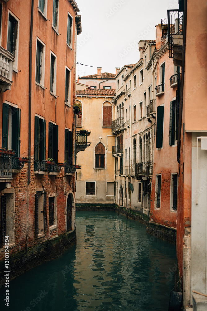 canal between houses in Venice canal between houses in Venice