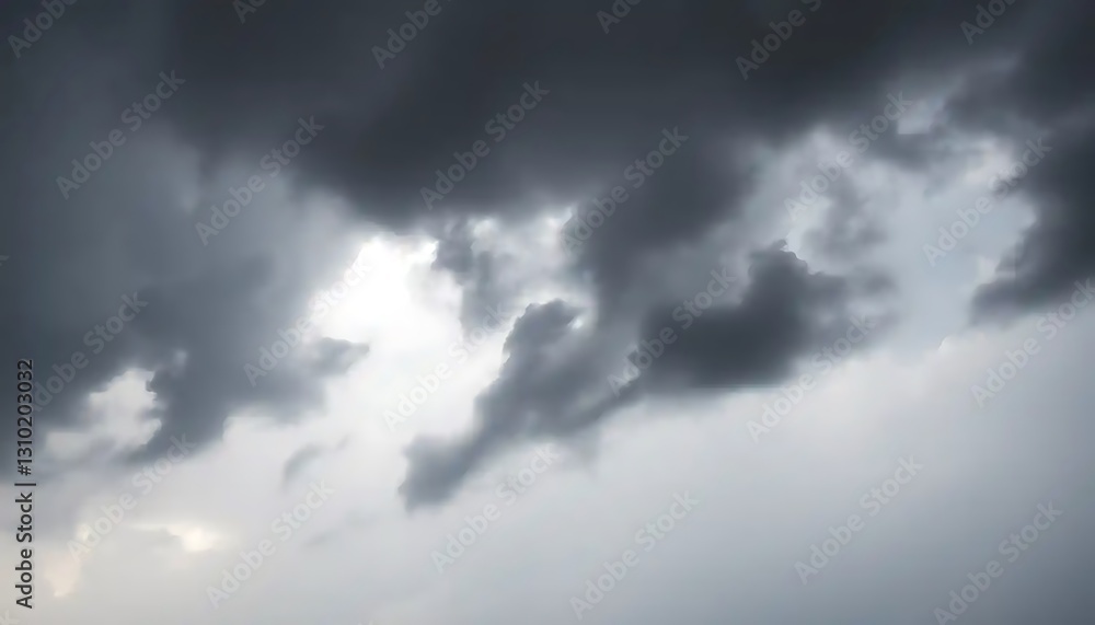 Obraz premium Dramatic Dark Clouds Gathering Before a Storm bringing an eerie atmosphere