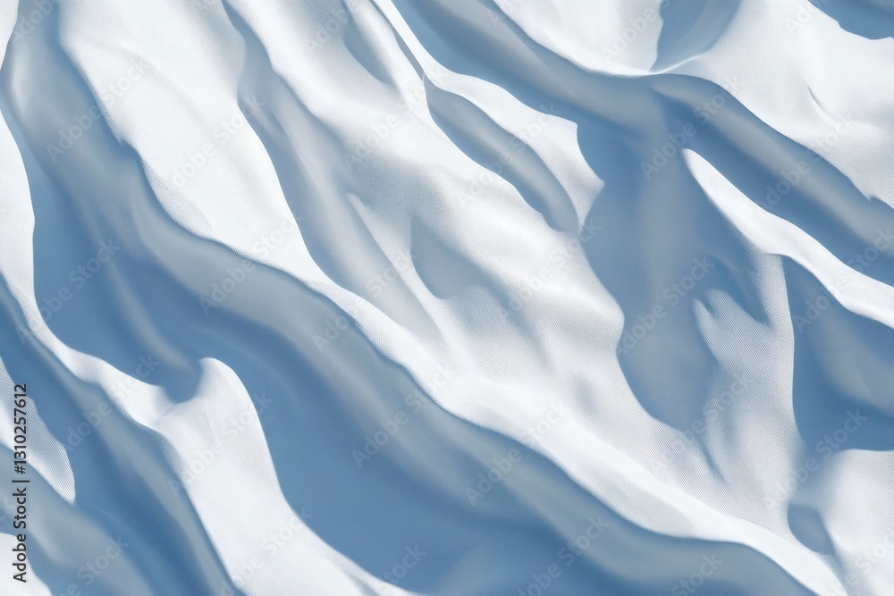 Obraz premium Aerial perspective showcases rippled white sand dunes against a blue sky