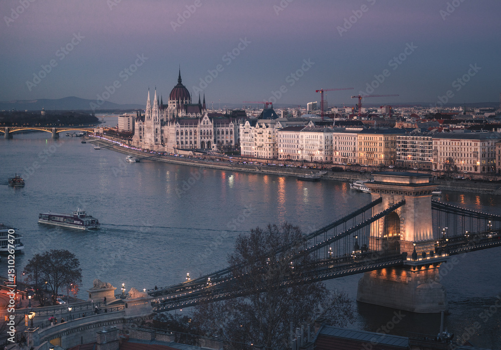 Famous Chain Bridge and the Hungarian Parliament in dusk