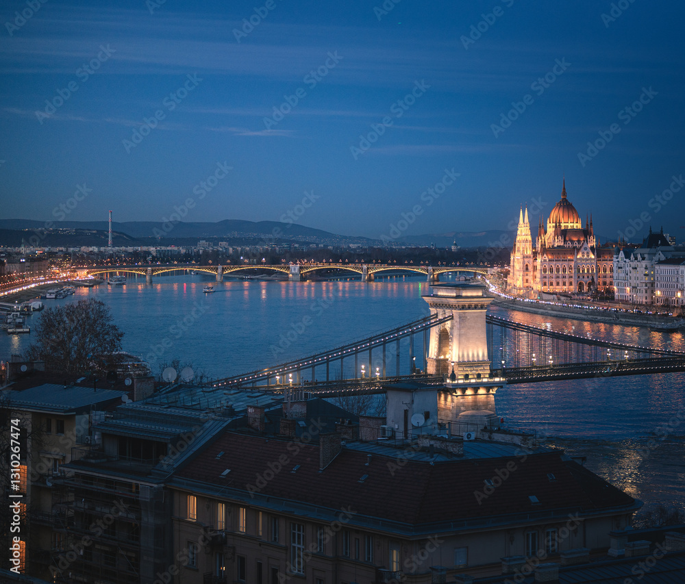Famous Chain Bridge and the Hungarian Parliament in dusk